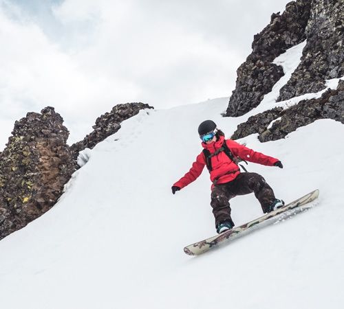 A woman snowboarding